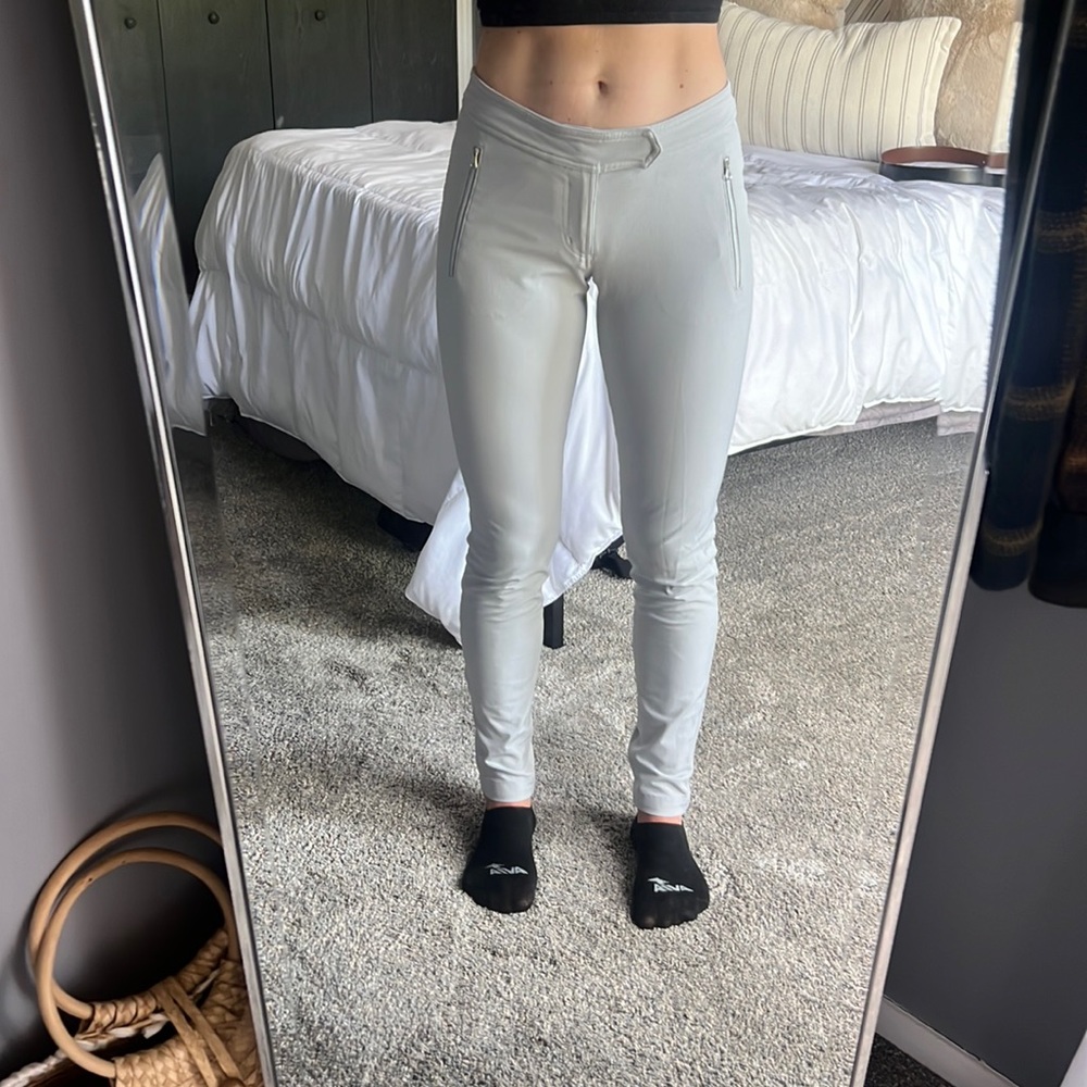 Lululemon dual pants, with reflective pocket flap
